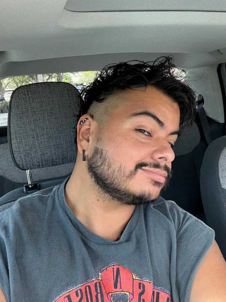Modern barber cut and beard shaping by Heather Wahl