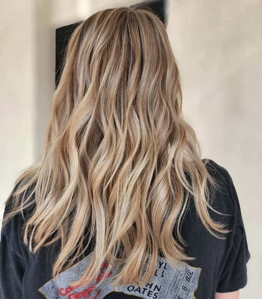 Blonde hair extensions by Heather Wahl